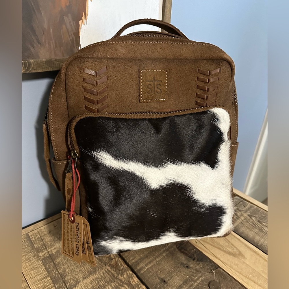 STS Ranchwear genuine leather and cow hide backpack.